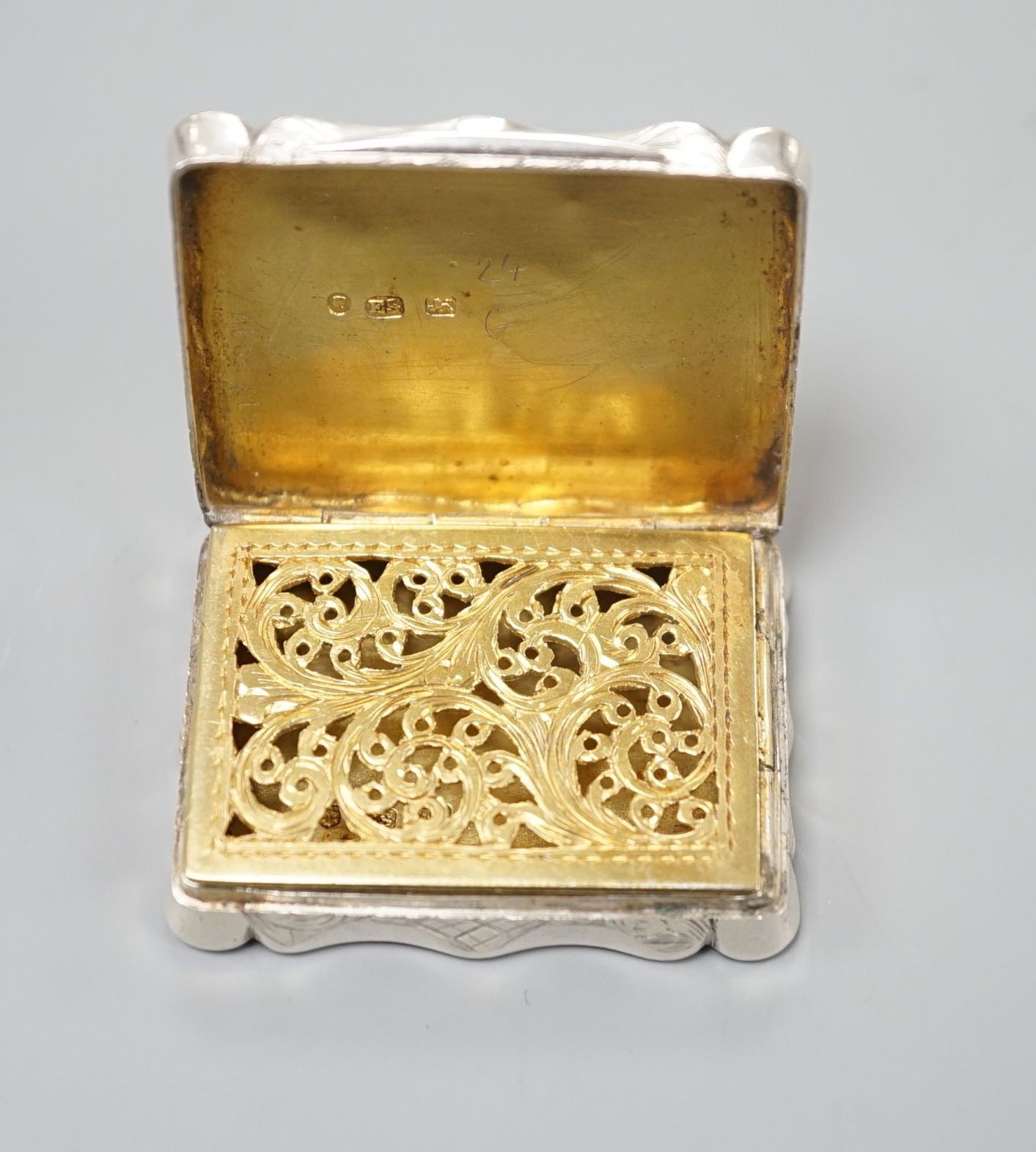 An early Victorian engraved silver vinaigrette, Edward Smith, Birmingham, 1845, 41mm.